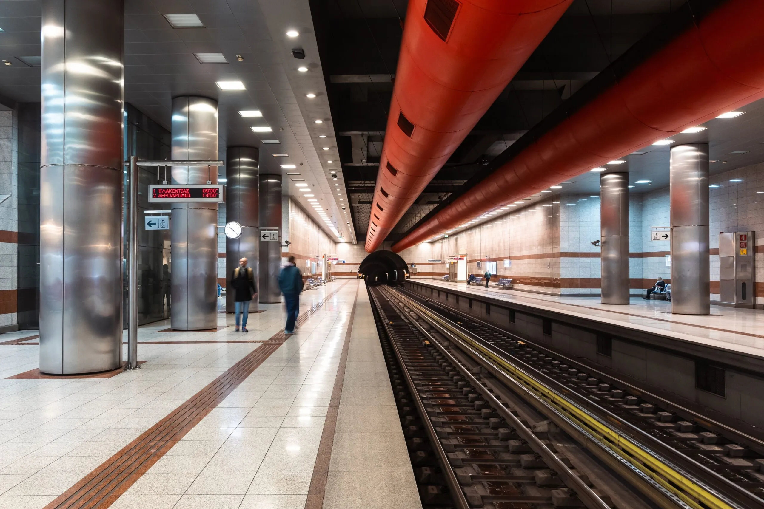 A modern underground platform helps travelers navigate the Athens Metro map.