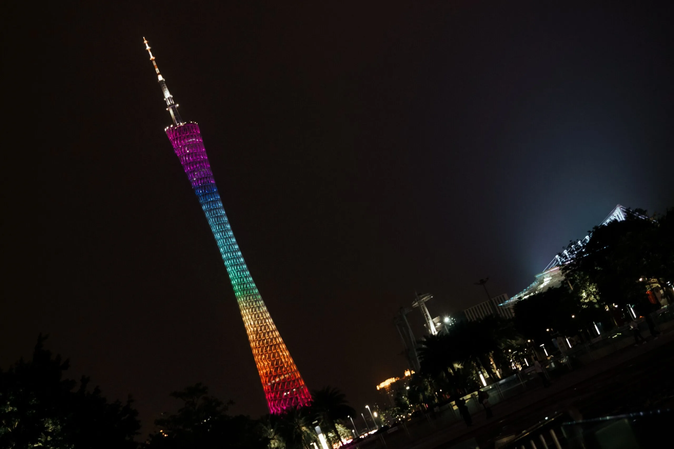The illuminated Canton Tower is a major visitor landmark served by public transport in Guangzhou.